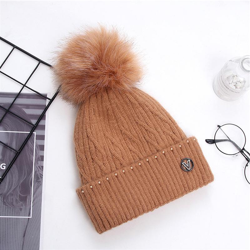 Autumn and winter Korean sweet and lovely pearl hat brim V letter wool ball Knitted Warm thread hat