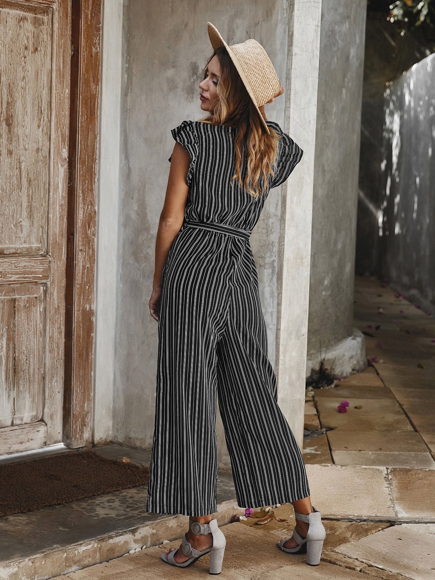 Black Stripe Sleeveless Jumpsuit With V Neckline