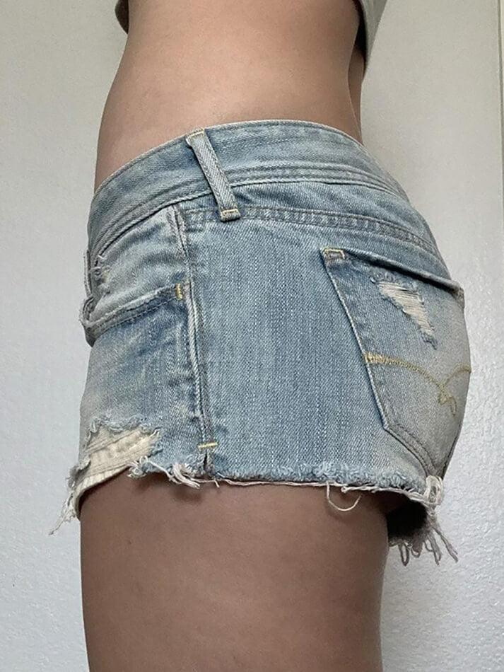 Low-Rise Frayed Denim Shorts