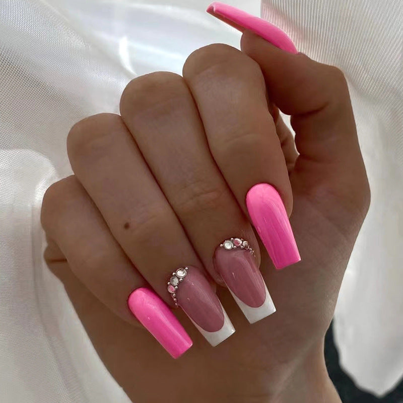 Long Barbie Pink Solid Nails with French Slanted Diamond Accents