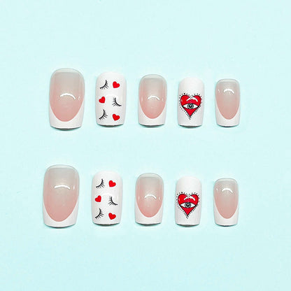 Unique Red Heart Monster Nails with Eyelash Accents