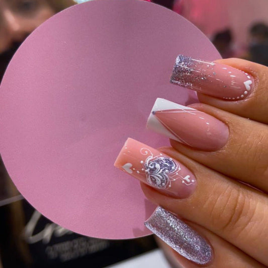 White V-Shaped French Nails with Silver Glitter and Cupid Hearts