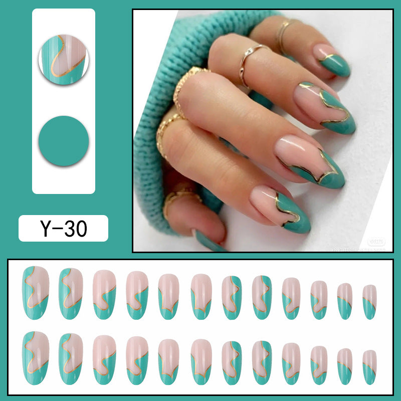 Mint Green Nail Tips with Gold Wave Design