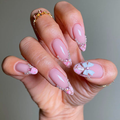 Almond Shaped Nails with Ombre Pearl and Bow Design