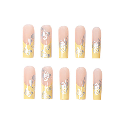 Yellow French Tip Nails with Silver Butterfly Design