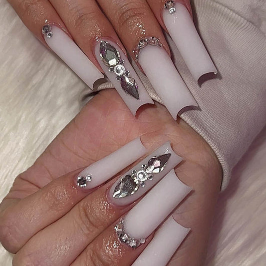 Stylish Pure White Nails with Sparkling Diamonds