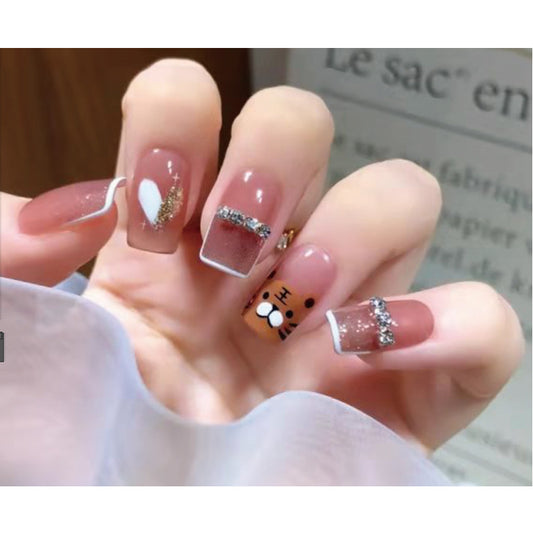 Sparkling Tiger-Themed Nail Extensions with Rhinestones and Chain