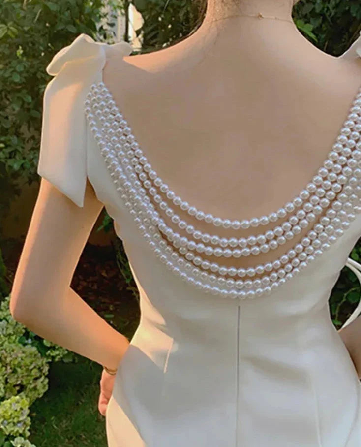 Free shipping for Temperament Pearl Backless Beading Bow White Women's Evening Dress Sleeveless Back Split Dresses