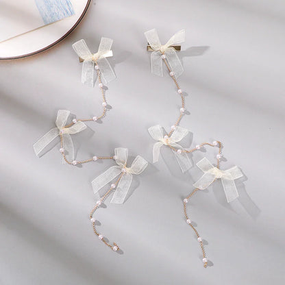 Free shipping for Bow Cute Hairpin Pink Blue Fashion Hair Clips Word Clip For Girls Sweet Travel Styling Tools Hair Accessories Korean Headwear