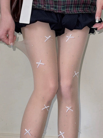 Glittering bows tights