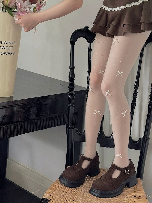 Glittering bows tights